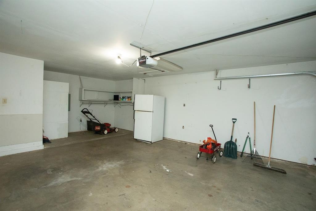 1202 Randy Drive Graham, TX 76450 - Photo 26 of 32 Shelving in garage.