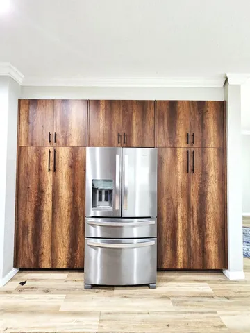 a kitchen with a sink and cabinets