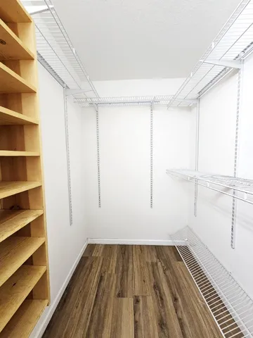 a bathroom with a sink a toilet a bathtub and shower