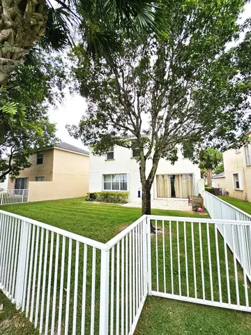 a garden view with a seating space