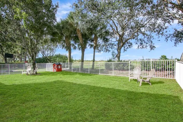a view of a yard with plants