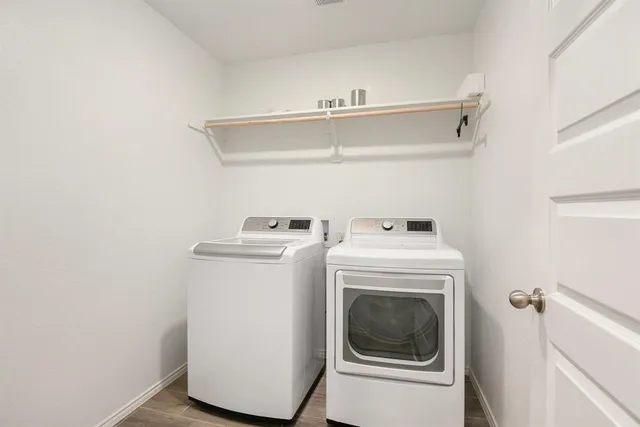 a utility room with dryer and washer