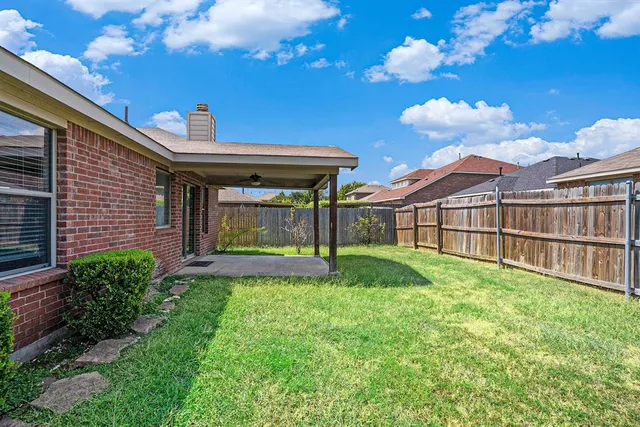 a view of a porch with a yard