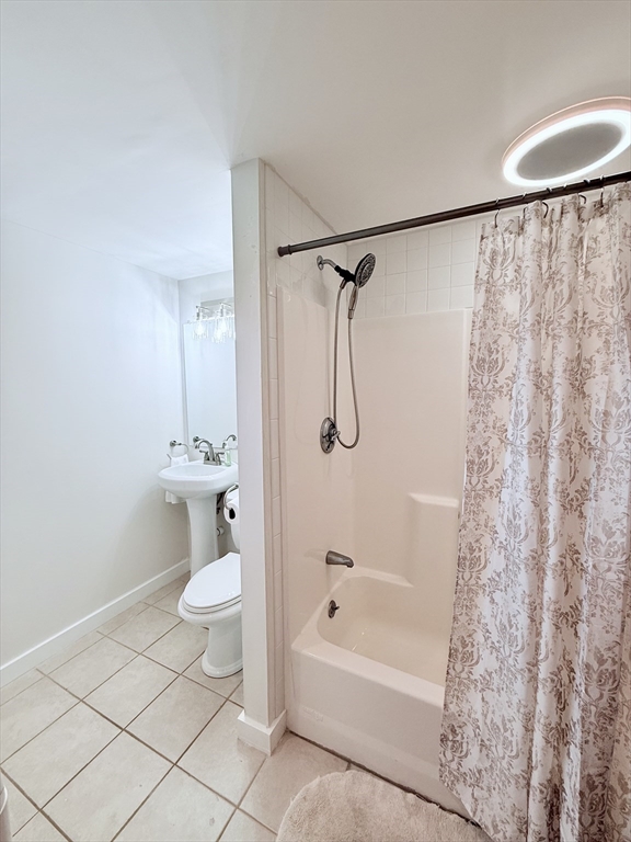 975 South Main Street Bellingham, MA 02019 - Photo 27 of 38 a bathroom with a sink toilet and shower
