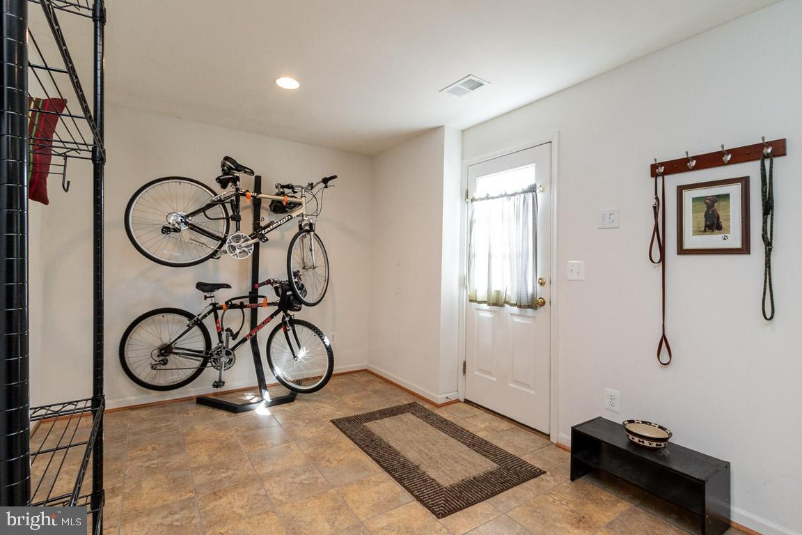 4623 Spring Run Road Warrenton, VA 20187 - Photo 46 of 53 Tiled exit to the patio - good for pets and bikes