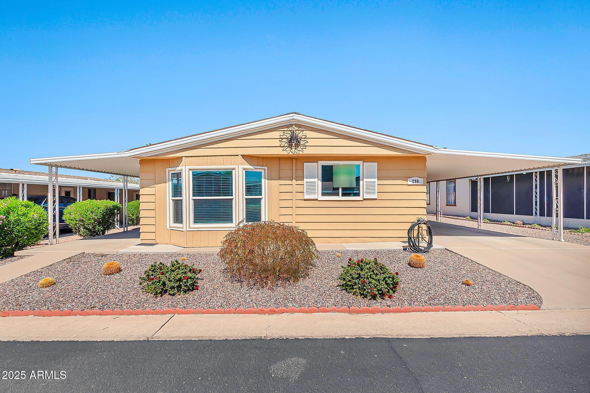 5402 East McKellips Road, Unit 298 Mesa, AZ 85215 - Photo 1 of 24 a house view with a outdoor space