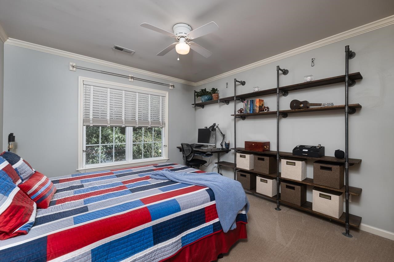 424 Willingham Road Morrisville, NC 27560 - Photo 19 of 30 Wood/Steel shelving is staying with the house so are the custom Eno clips to hang your hammock 3rd Bedroom