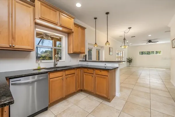 a view of an empty room and a window