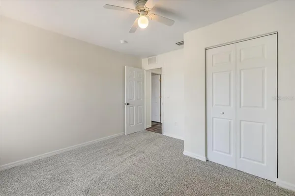 a view of a building with a floor to ceiling window with an outdoor space