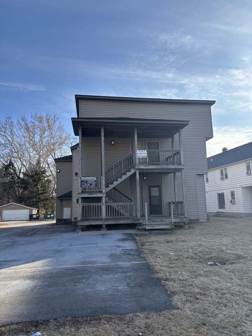 528 College Avenue DeKalb, IL 60115 - Photo 2 of 8 a house view with a outdoor space