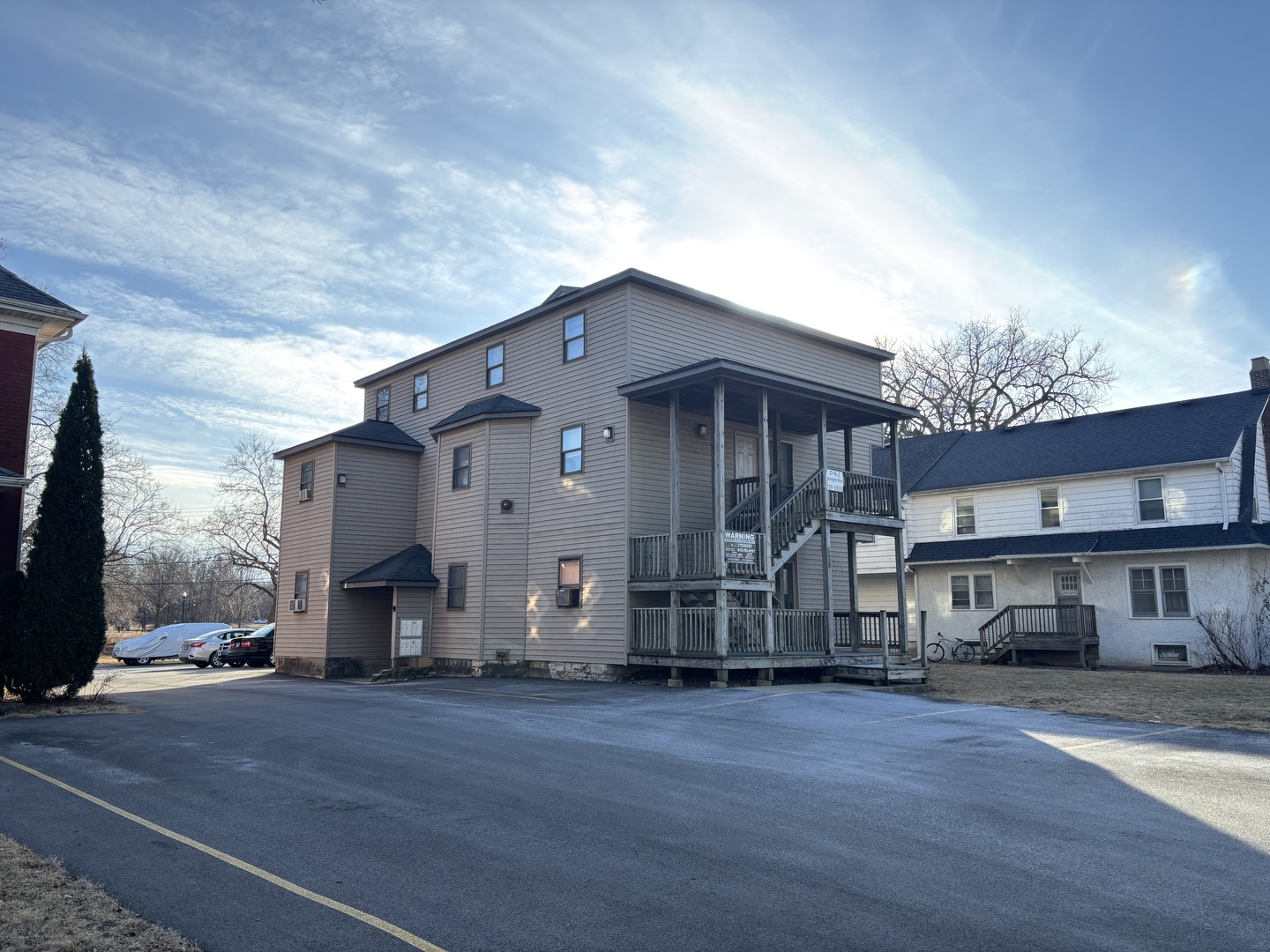 528 College Avenue DeKalb, IL 60115 - Photo 4 of 8 a view of a house with a street