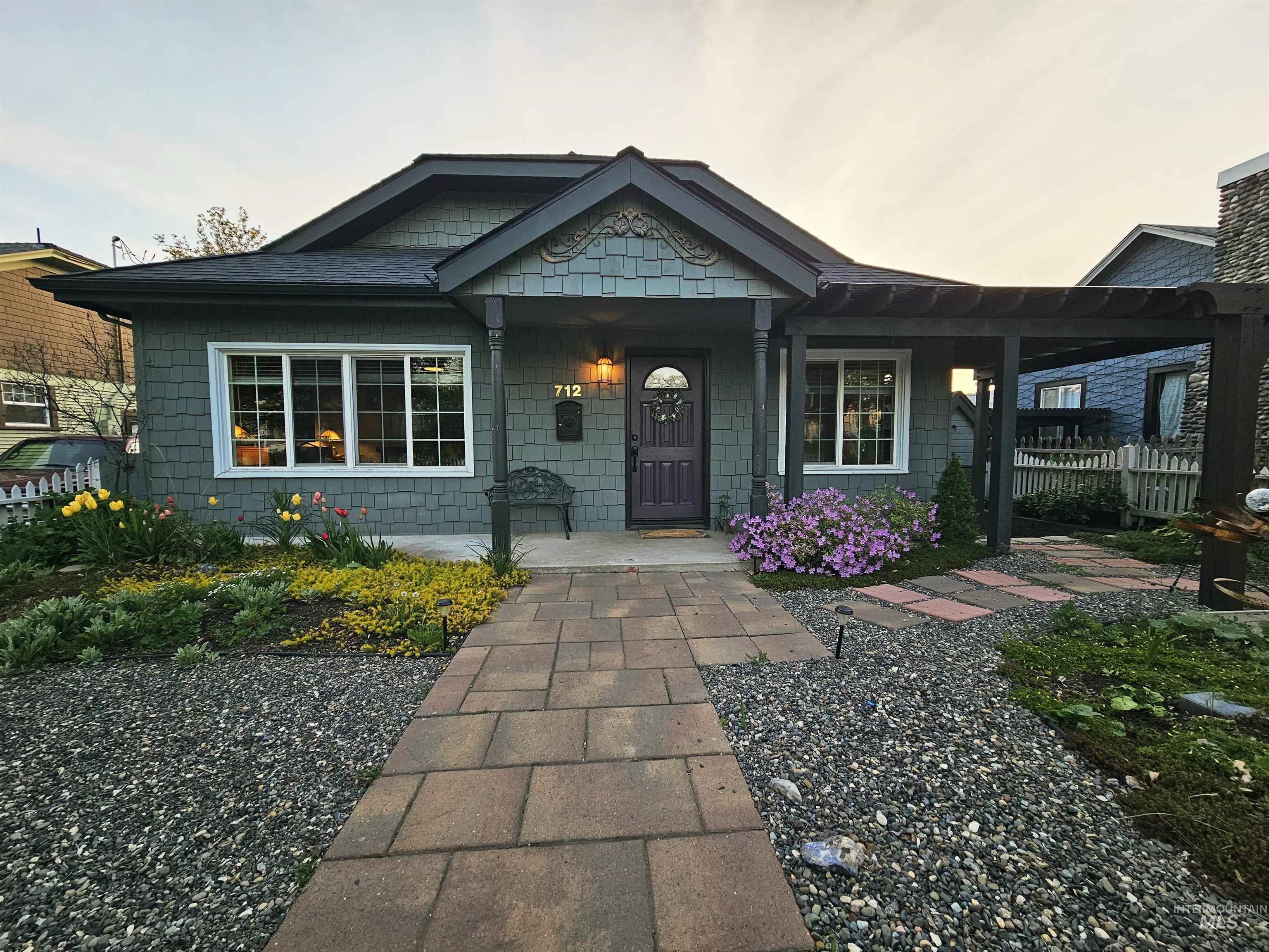 712 3rd Street Lewiston, ID 83501 - Photo 1 of 32 View of front of home with beautiful water efficient landscaping