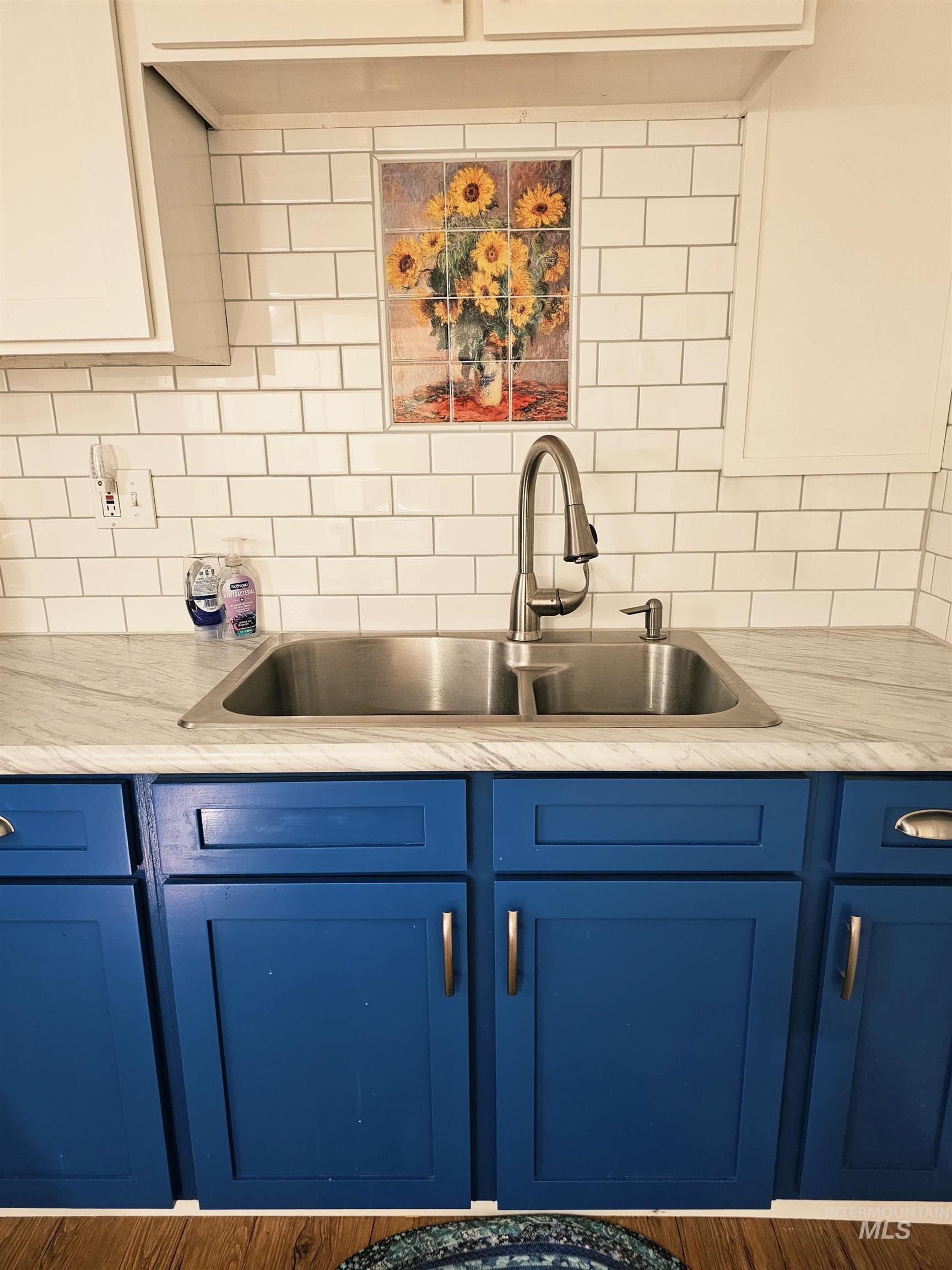 712 3rd Street Lewiston, ID 83501 - Photo 22 of 30 beautiful downstairs mosaic above the sink
