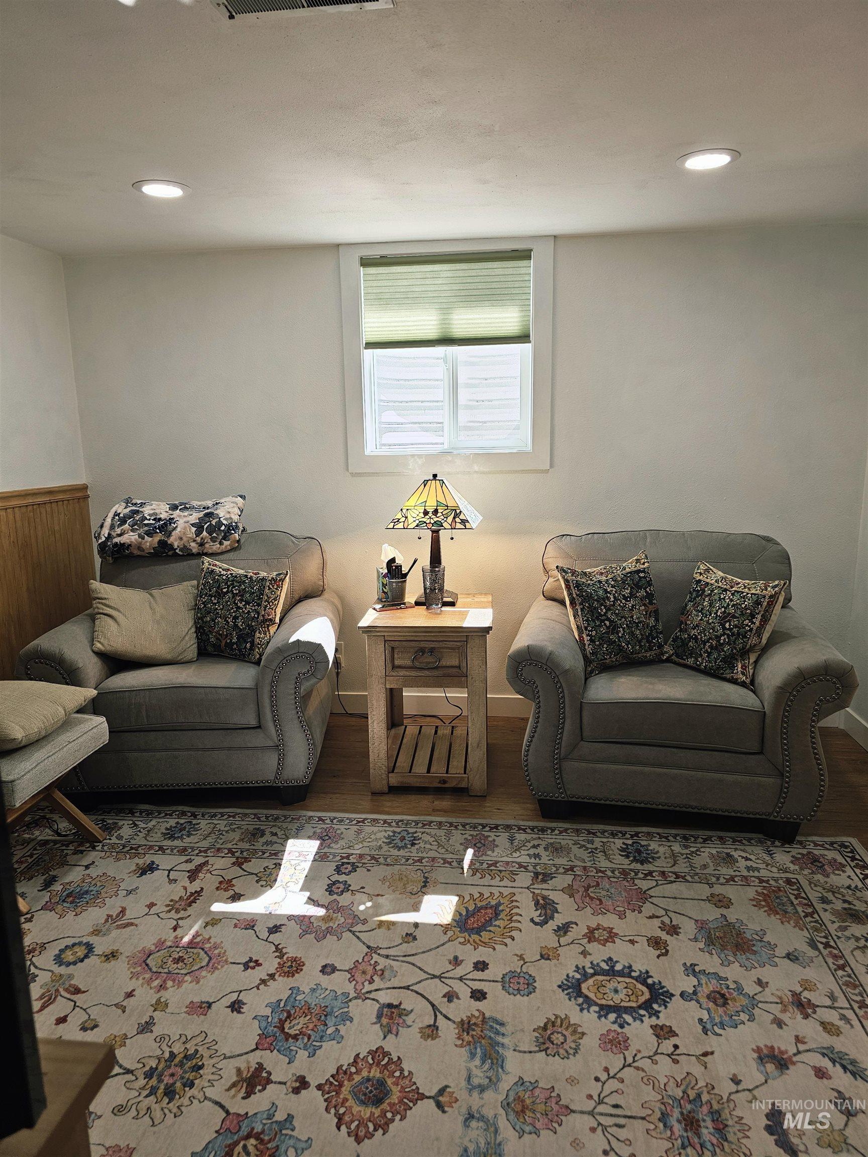 712 3rd Street Lewiston, ID 83501 - Photo 24 of 30 Living room featuring wood finished floors and recessed lighting