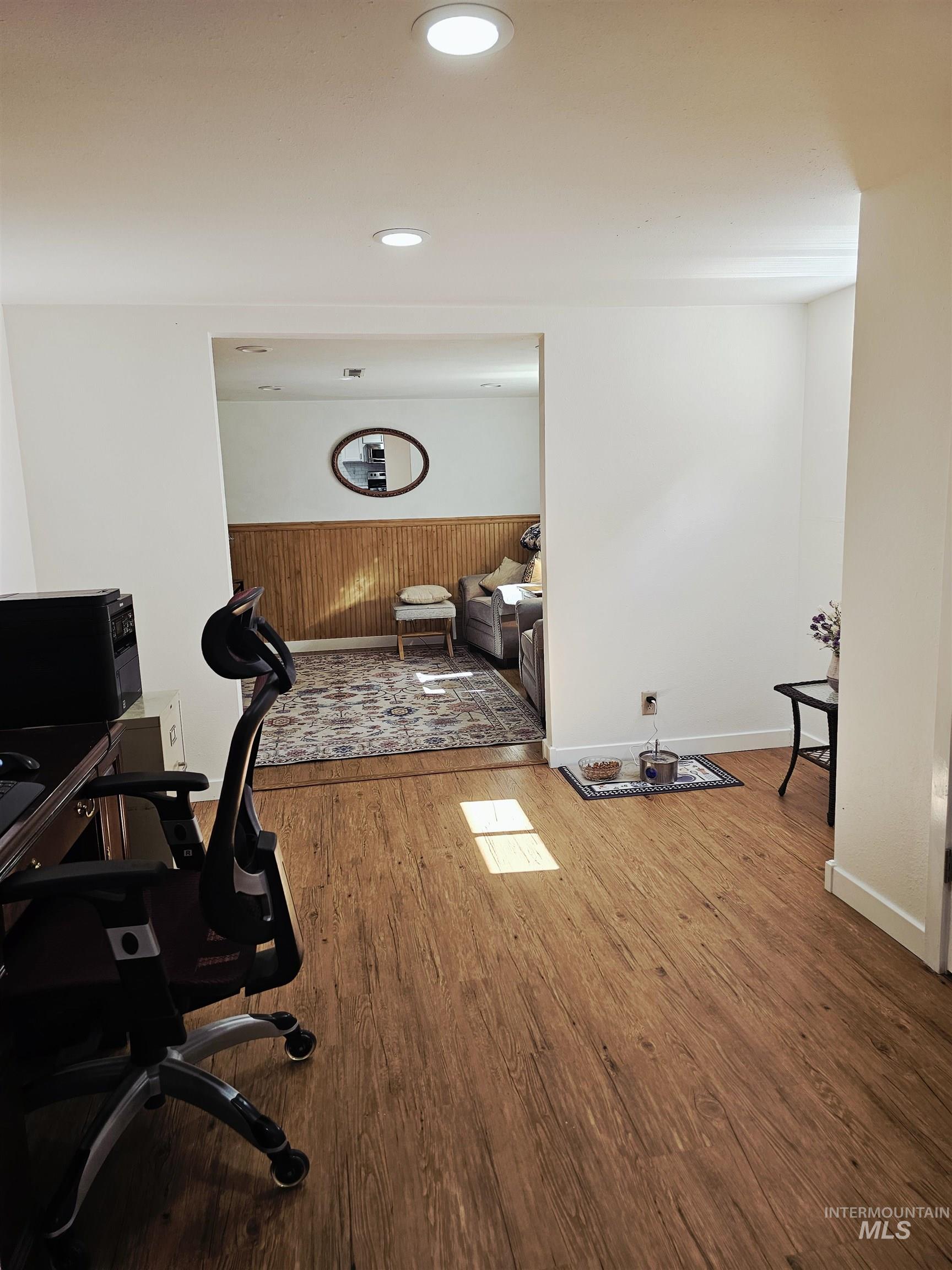 712 3rd Street Lewiston, ID 83501 - Photo 25 of 30 Home office with wainscoting, wood finished floors, wooden walls, and recessed lighting