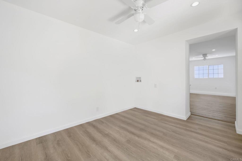 536 Hampton Road Burbank, CA 91504 - Photo 31 of 42 an empty room with wooden floor and windows