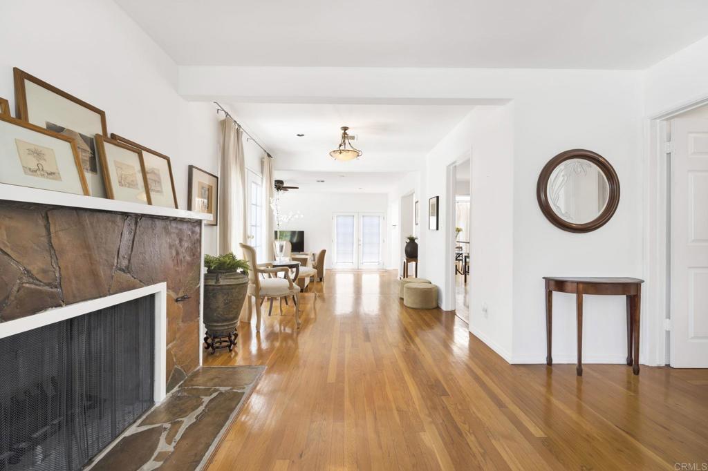 536 Hampton Road Burbank, CA 91504 - Photo 7 of 42 a living room with furniture a dining table and wooden floor