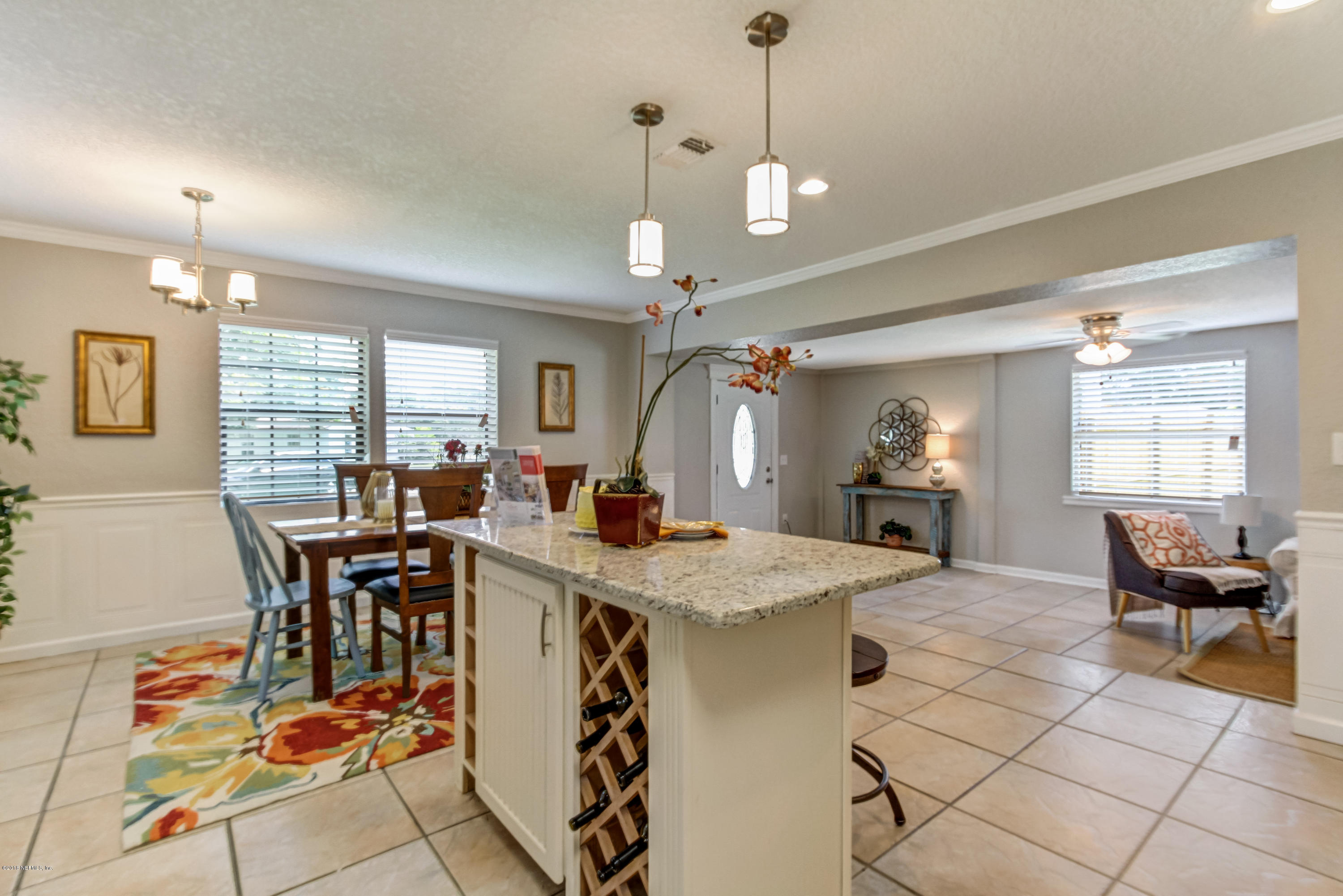 2586 Peach Drive Jacksonville, FL 32246 - Photo 16 of 32 Kitchen Island and Wine Rack
