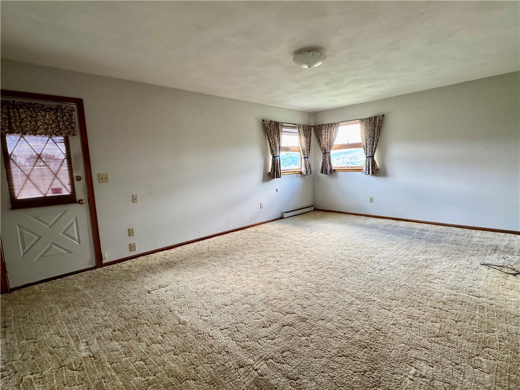 988 Swart Hollow Road Oneonta, NY 13820 - Photo 17 of 47 Main bedroom with door to private deck