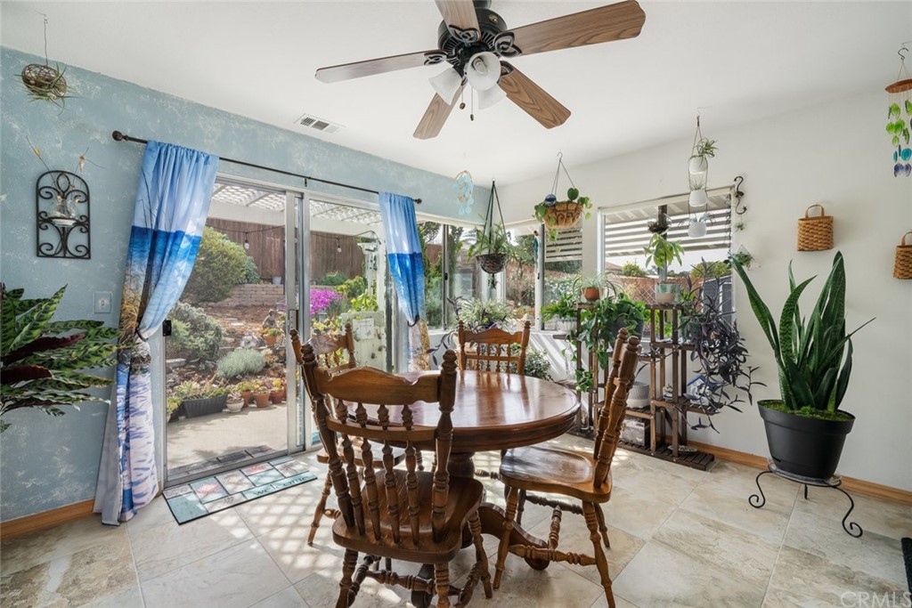 765 Lilac Drive Los Osos, CA 93402 - Photo 12 of 54 a view of a dining room with furniture window and outside view