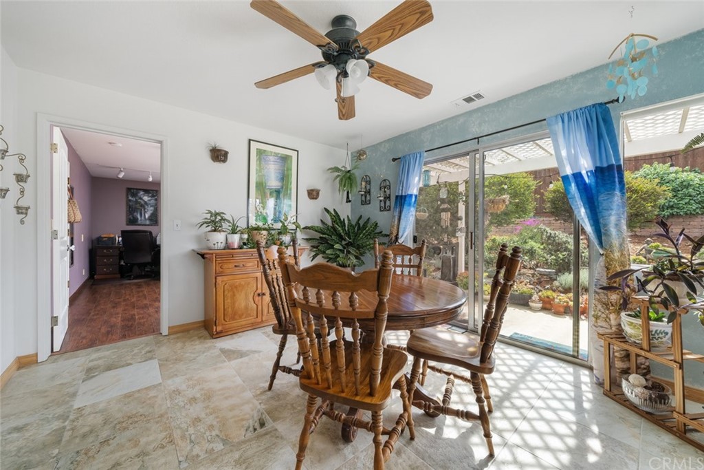 765 Lilac Drive Los Osos, CA 93402 - Photo 13 of 54 a view of a dining room with furniture window and outside view