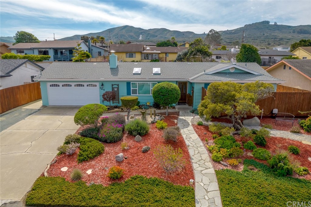 765 Lilac Drive Los Osos, CA 93402 - Photo 2 of 54 an aerial view of a house with a garden