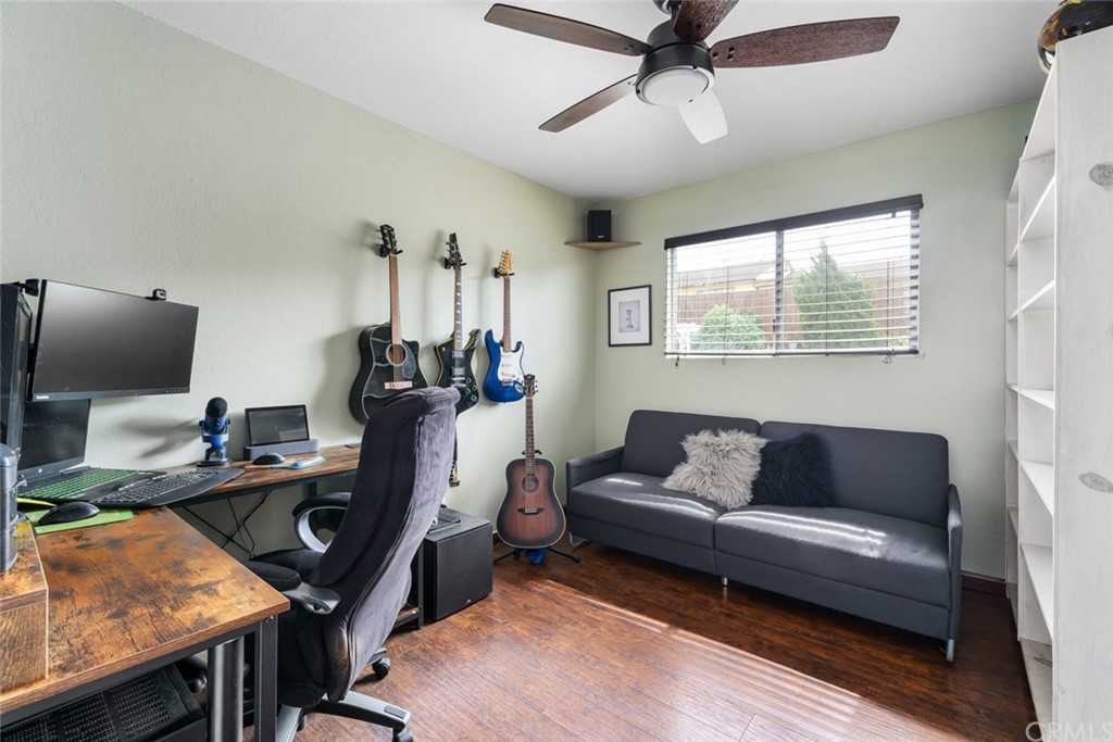 765 Lilac Drive Los Osos, CA 93402 - Photo 27 of 54 a living room with furniture and a window