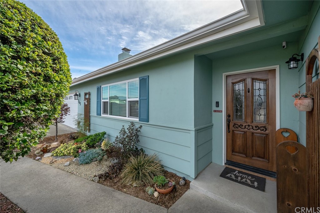 765 Lilac Drive Los Osos, CA 93402 - Photo 3 of 54 a front view of a house