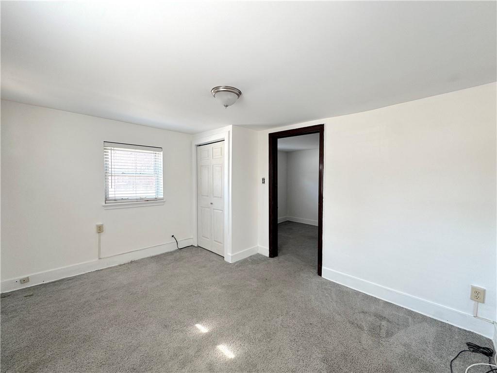 30 South 13th Street Pittsburgh, PA 15203 - Photo 12 of 13 an empty room with windows and closet