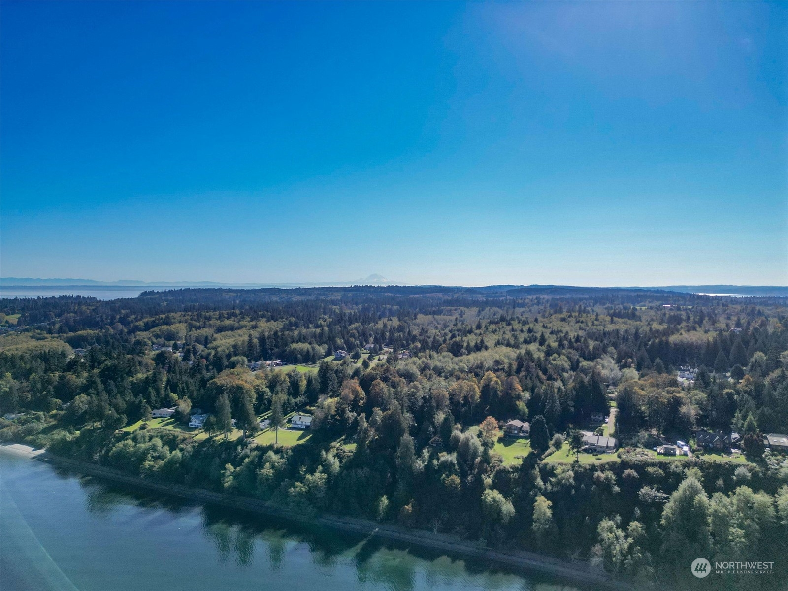 0 Northeast Twin Spits Road Hansville, WA 98340 - Photo 9 of 29 a view of a city with tall buildings
