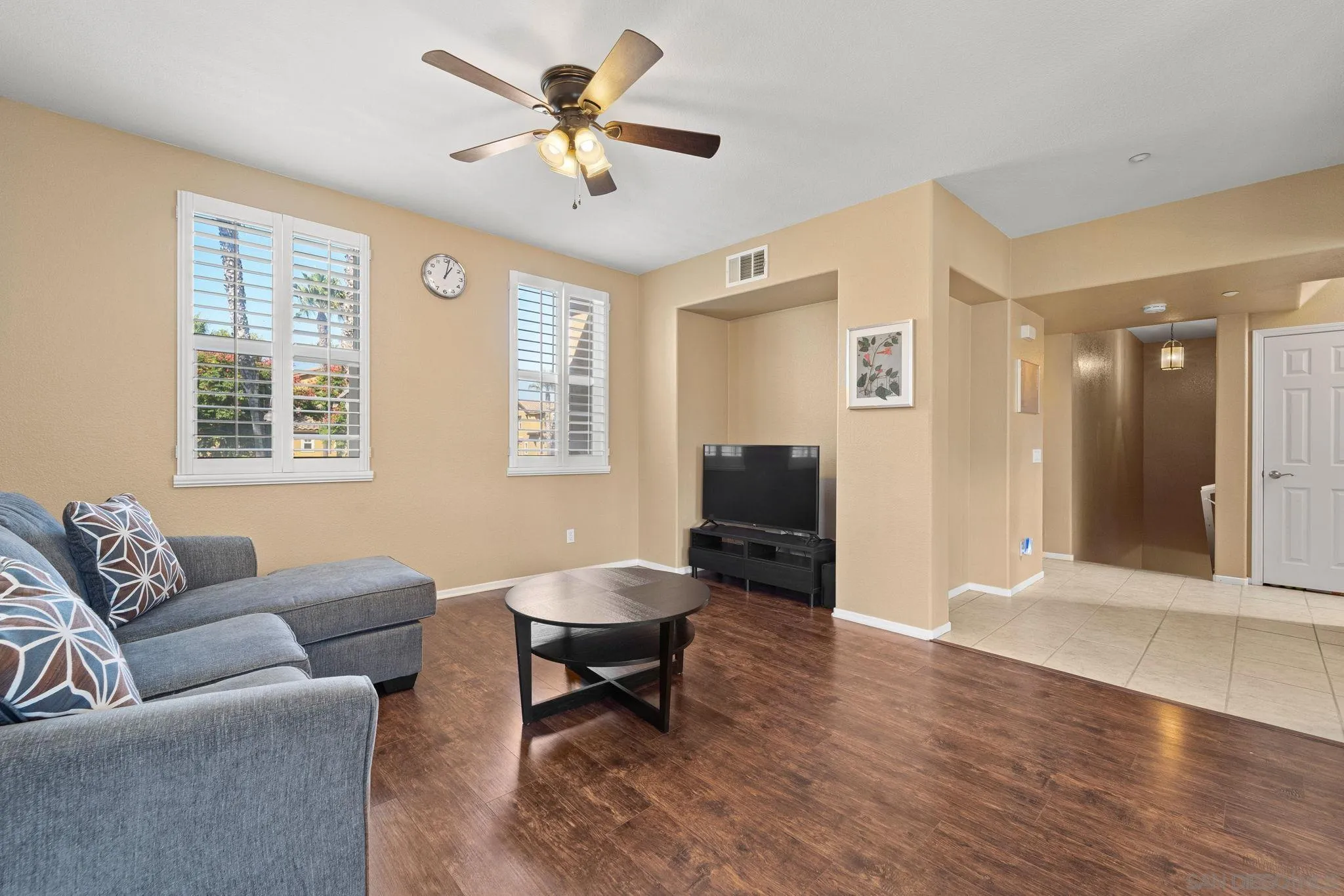812 Compass Way San Diego, CA 92154 - Photo 15 of 39 a living room with furniture and a window