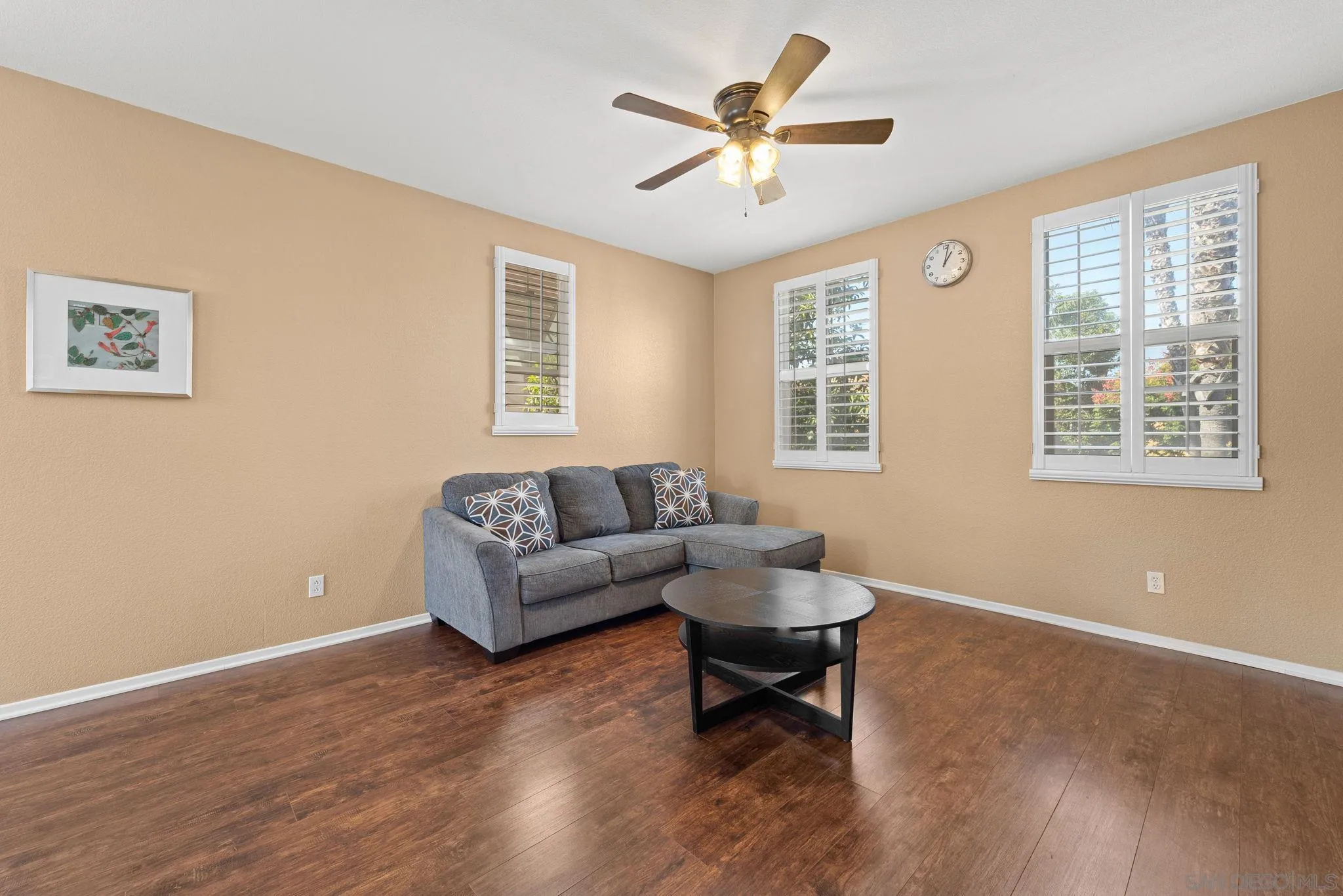 812 Compass Way San Diego, CA 92154 - Photo 16 of 39 a living room with furniture and a window