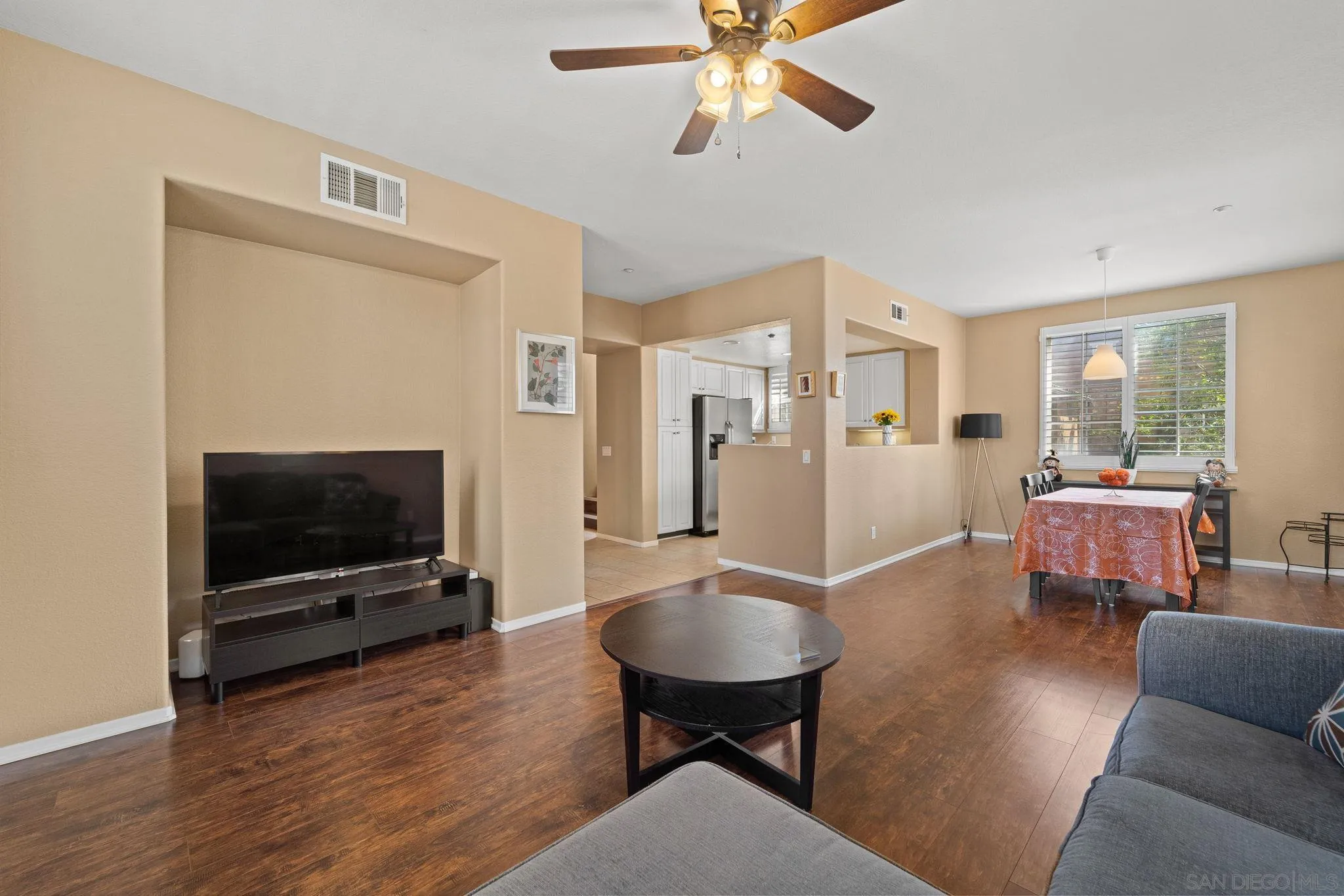 812 Compass Way San Diego, CA 92154 - Photo 18 of 39 a living room with furniture and a flat screen tv