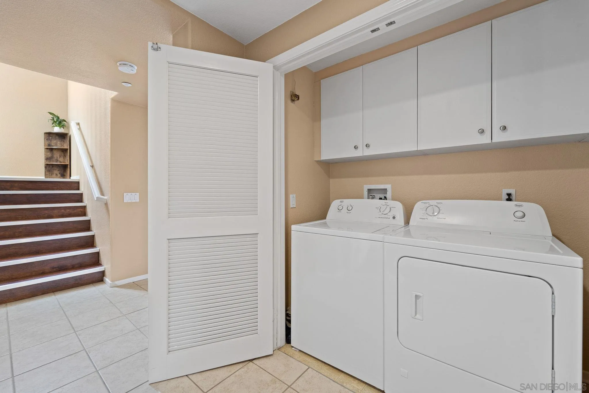 812 Compass Way San Diego, CA 92154 - Photo 27 of 39 a utility room with dryer and washer