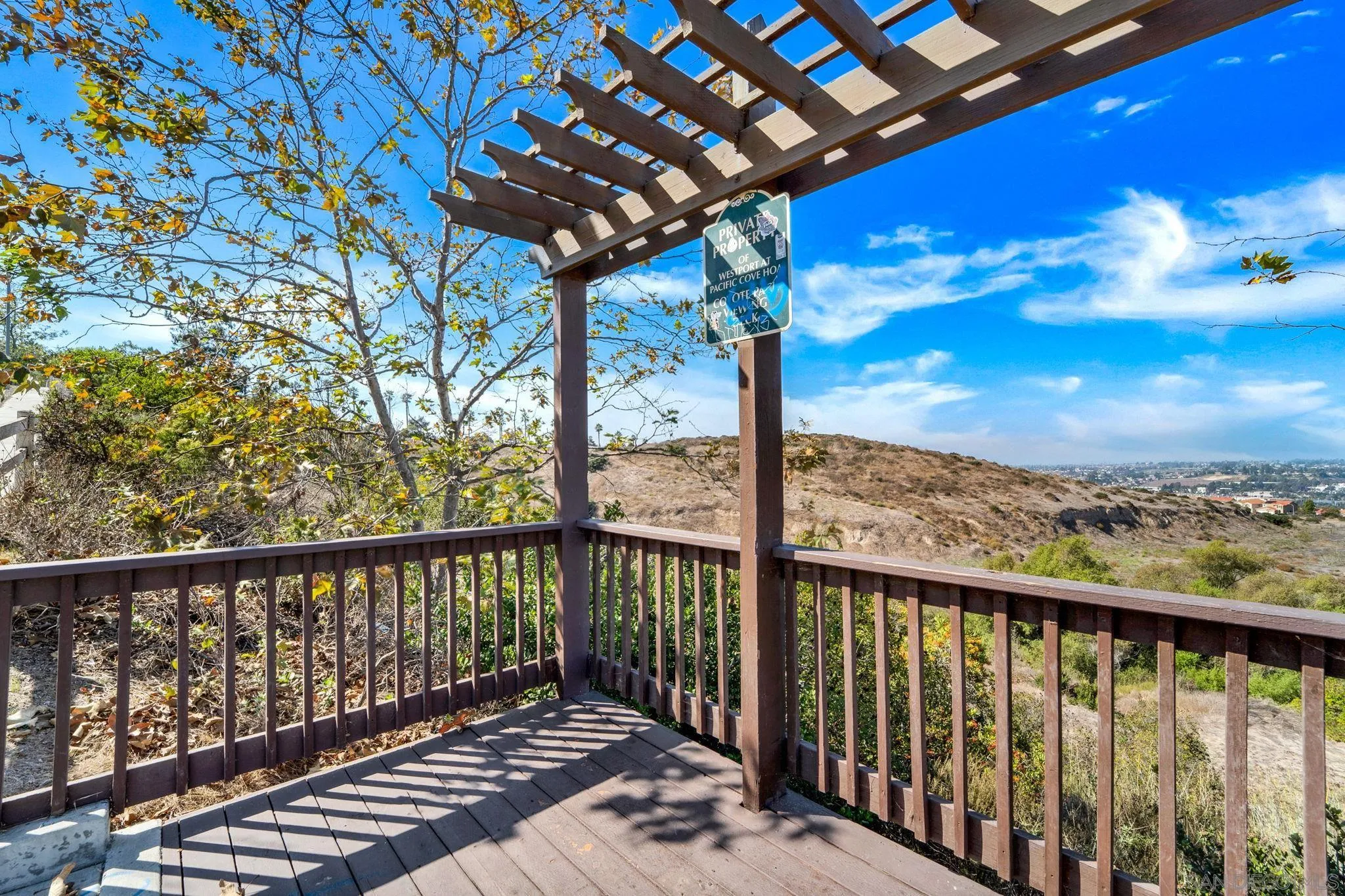 812 Compass Way San Diego, CA 92154 - Photo 33 of 39 a view of a porch with a table and chairs next to a yard