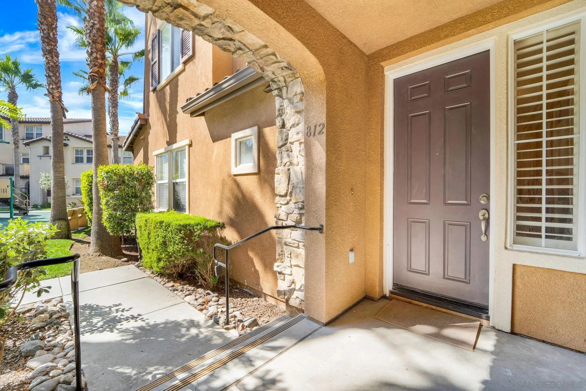 812 Compass Way San Diego, CA 92154 - Photo 4 of 39 a view of a house with a outdoor space