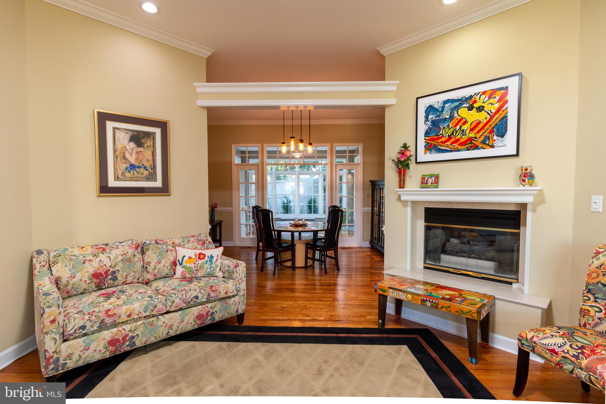 2395 Bear Den Road Frederick, MD 21701 - Photo 6 of 27 Cozy living room with dual fireplace