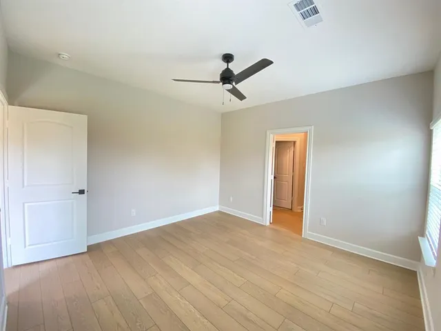 a view of an empty room and window