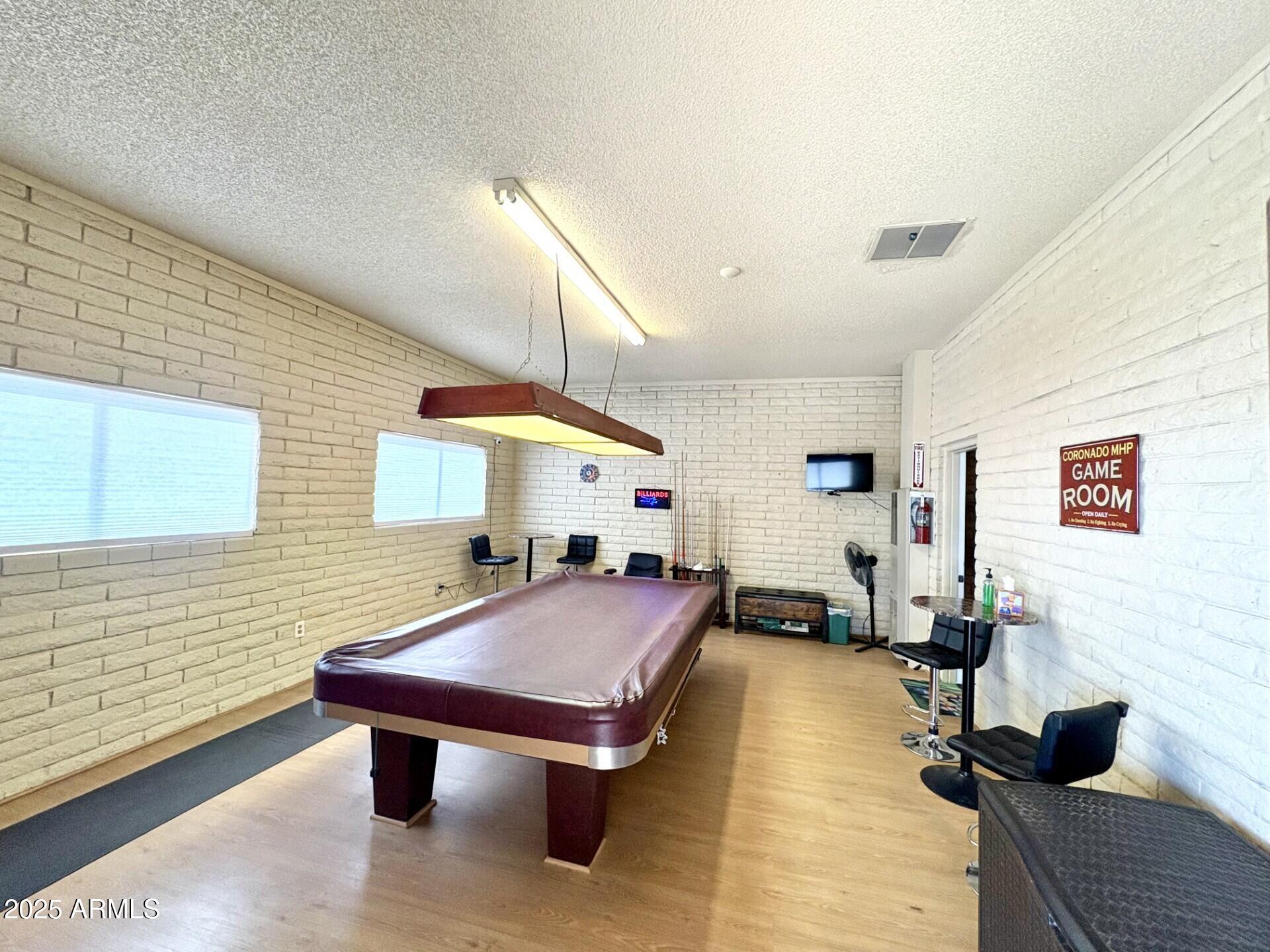 2700 East Allred Avenue, Unit R89 Mesa, AZ 85204 - Photo 27 of 28 a view of a livingroom with furniture and a flat screen tv