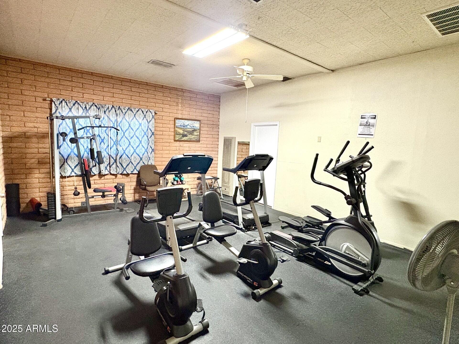 2700 East Allred Avenue, Unit R89 Mesa, AZ 85204 - Photo 28 of 28 a room with gym equipment