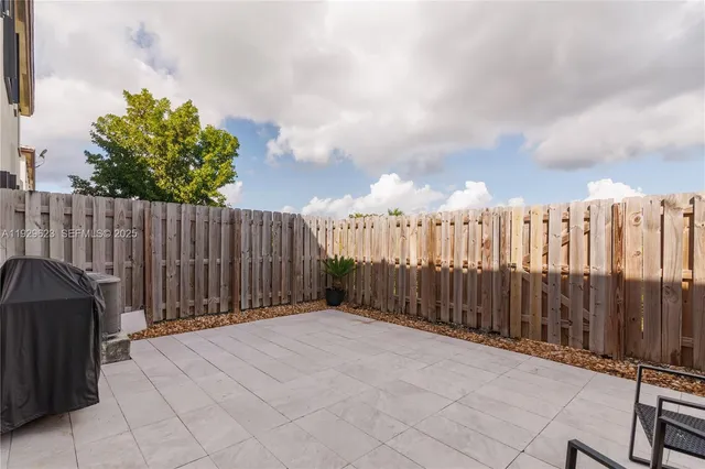 a view of a wooden fence