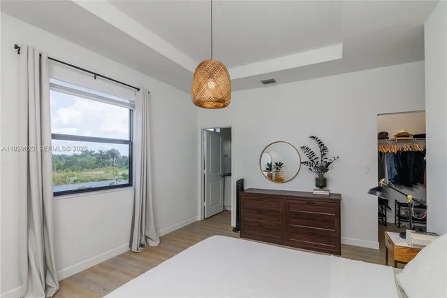 a view of a hallway with entryway