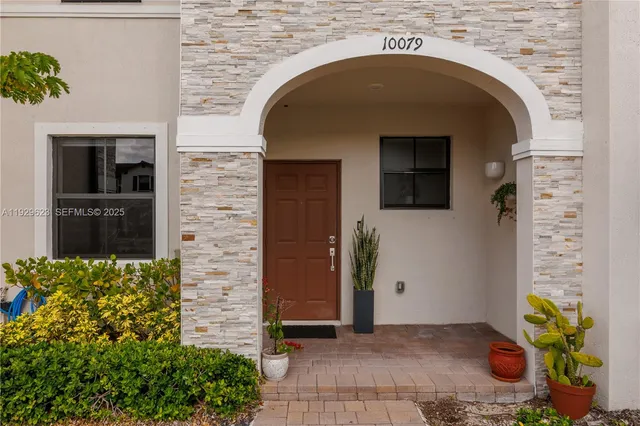 a view of entrance gate of a house