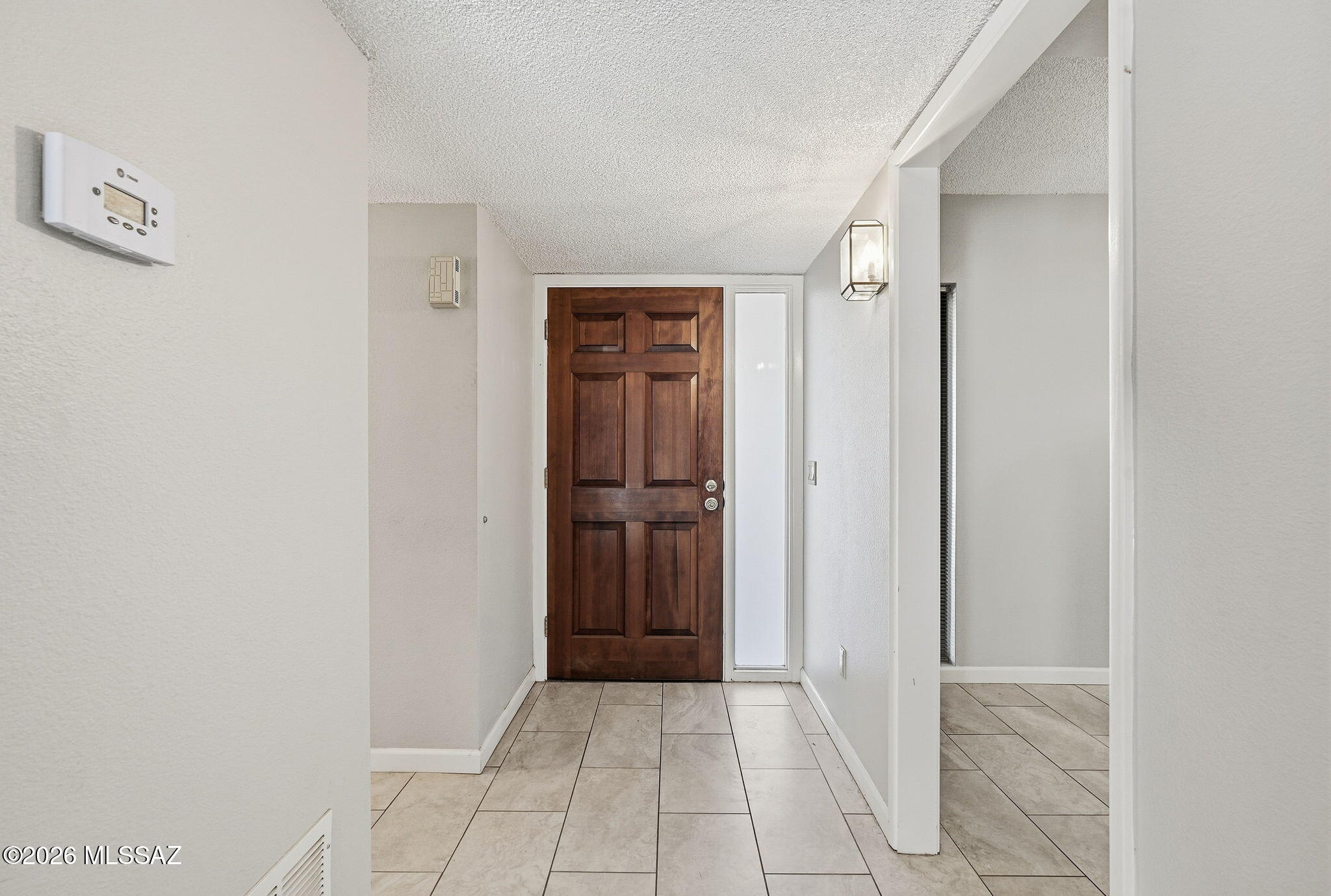 1949 North Swan Road, Unit 31 Tucson, AZ 85712 - Photo 6 of 33 front door from inside