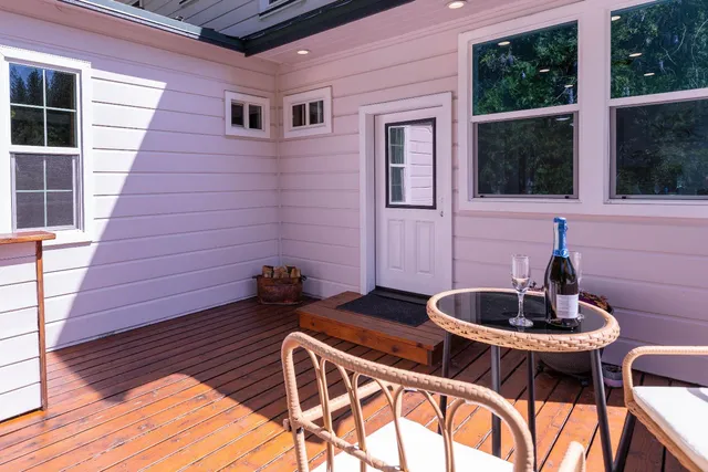 a backyard of a house with seating space