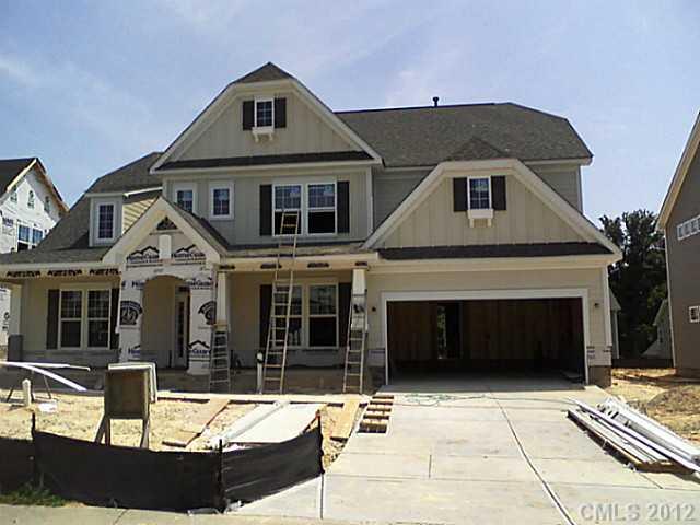 1625 Ridgehaven Road, Unit MB 239 Waxhaw, NC 28173 - Photo 1 of 12 a front view of a house with yard