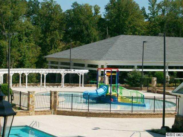 1625 Ridgehaven Road, Unit MB 239 Waxhaw, NC 28173 - Photo 11 of 12 a view of a swimming pool with a patio