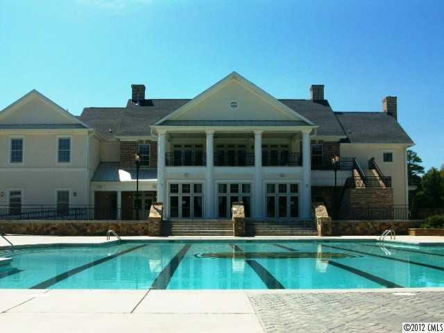 1625 Ridgehaven Road, Unit MB 239 Waxhaw, NC 28173 - Photo 7 of 12 a view of a house with a swimming pool