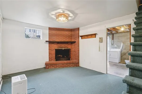 a bathroom with a shower and a toilet