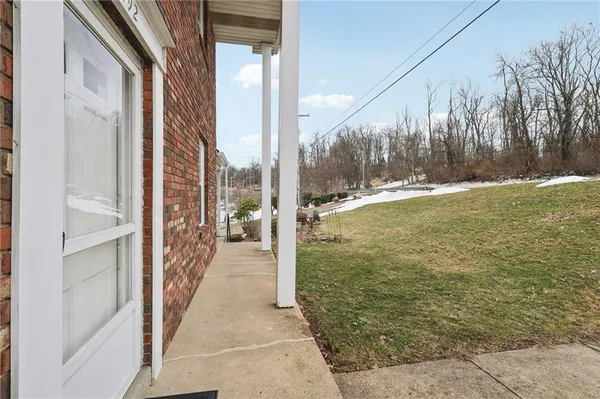 a front view of a house with a garage